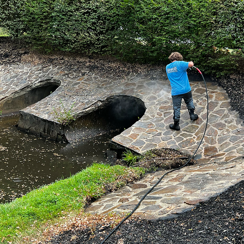 Power Washing stone common space for a HOA